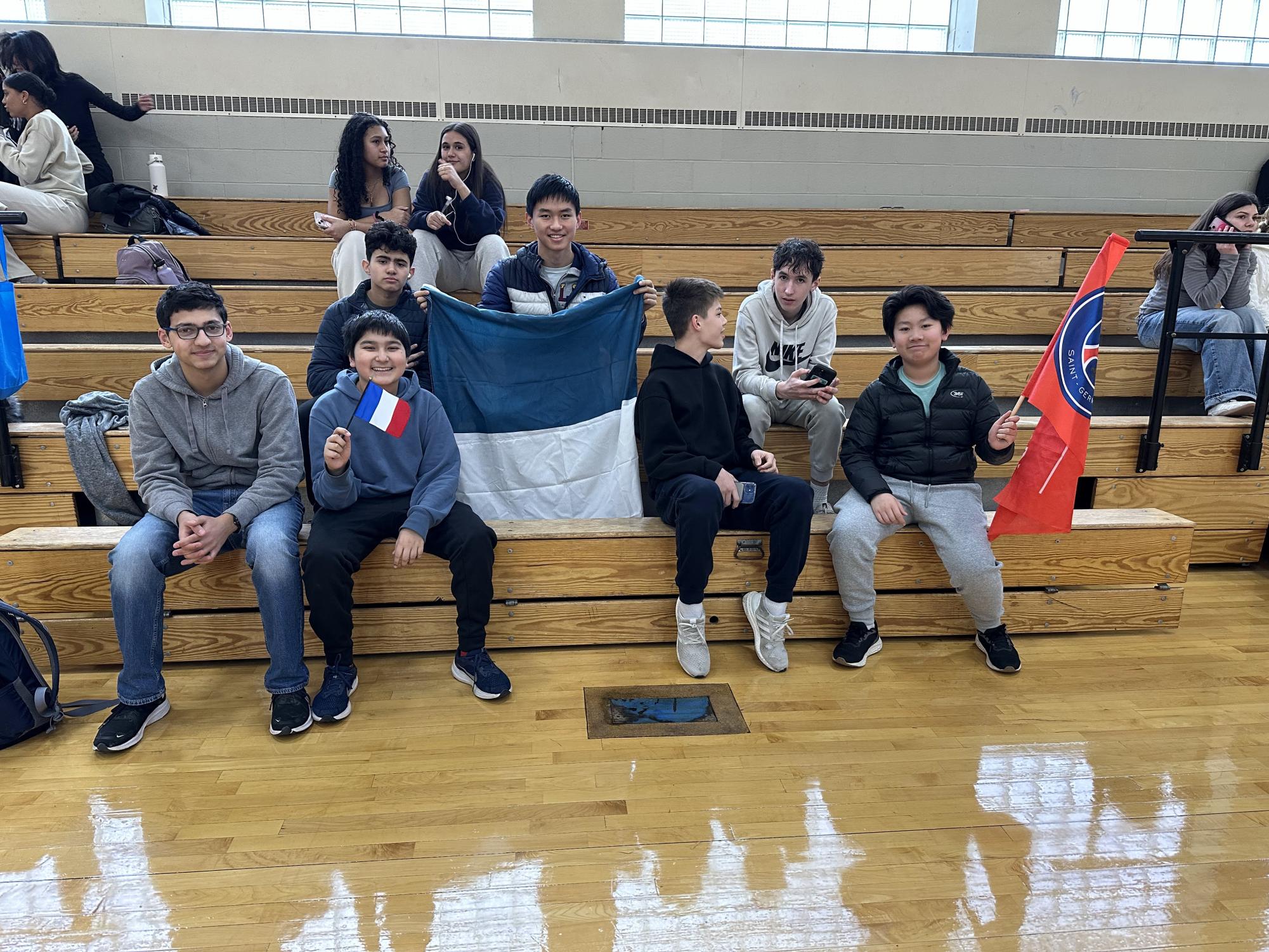 Students cheer on their classmates in the World Languages Week soccer tournament. (Staff Photo by Olivia Richter)