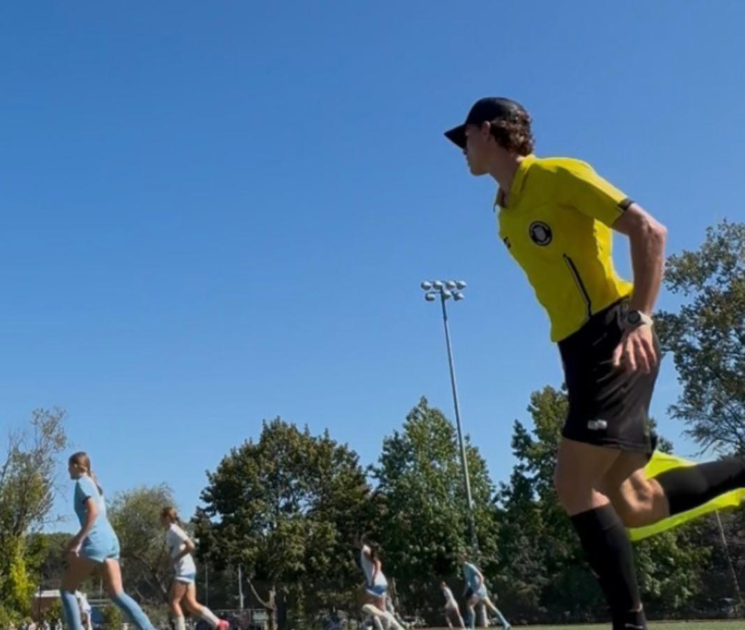 Zaria Wellesley '28 learned the ropes of soccer refereeing from her brother, Lukas Wellesley '26. (Photo Courtesy of Lukas Wellesley)