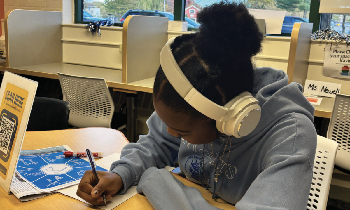 Trinity Lisenby ’28 works in the Academic Center. (Staff Photo by Olivia Richter)