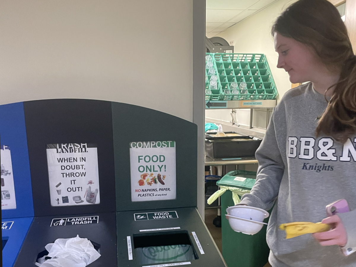 Quinn Reynolds ’27 sorts her waste after lunch. The Eco Reps plan to introduce a new garden bed project, requiring stricter food separation. “It’s a shame for us to have a composting system and to pay a company to do composting for us if we’re just going to contaminate every composting bucket,” Ms. Duddy said. (Staff Photo by Katy Varadi)