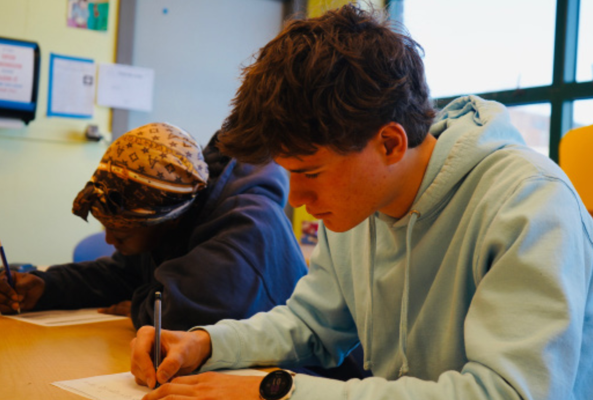 Lukas Wellesley ’26 completes an in-class assessment. (Staff Photo by Olivia Richter)