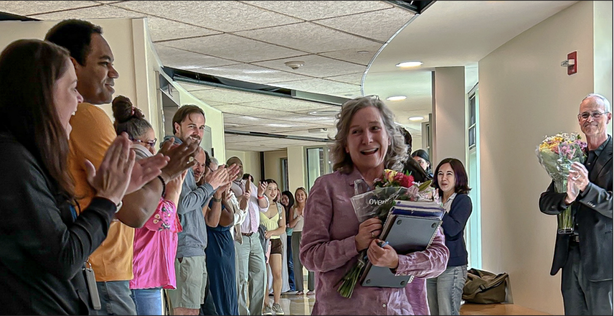 Students and faculty celebrate Ms. Krauss as she walks out of her last class.