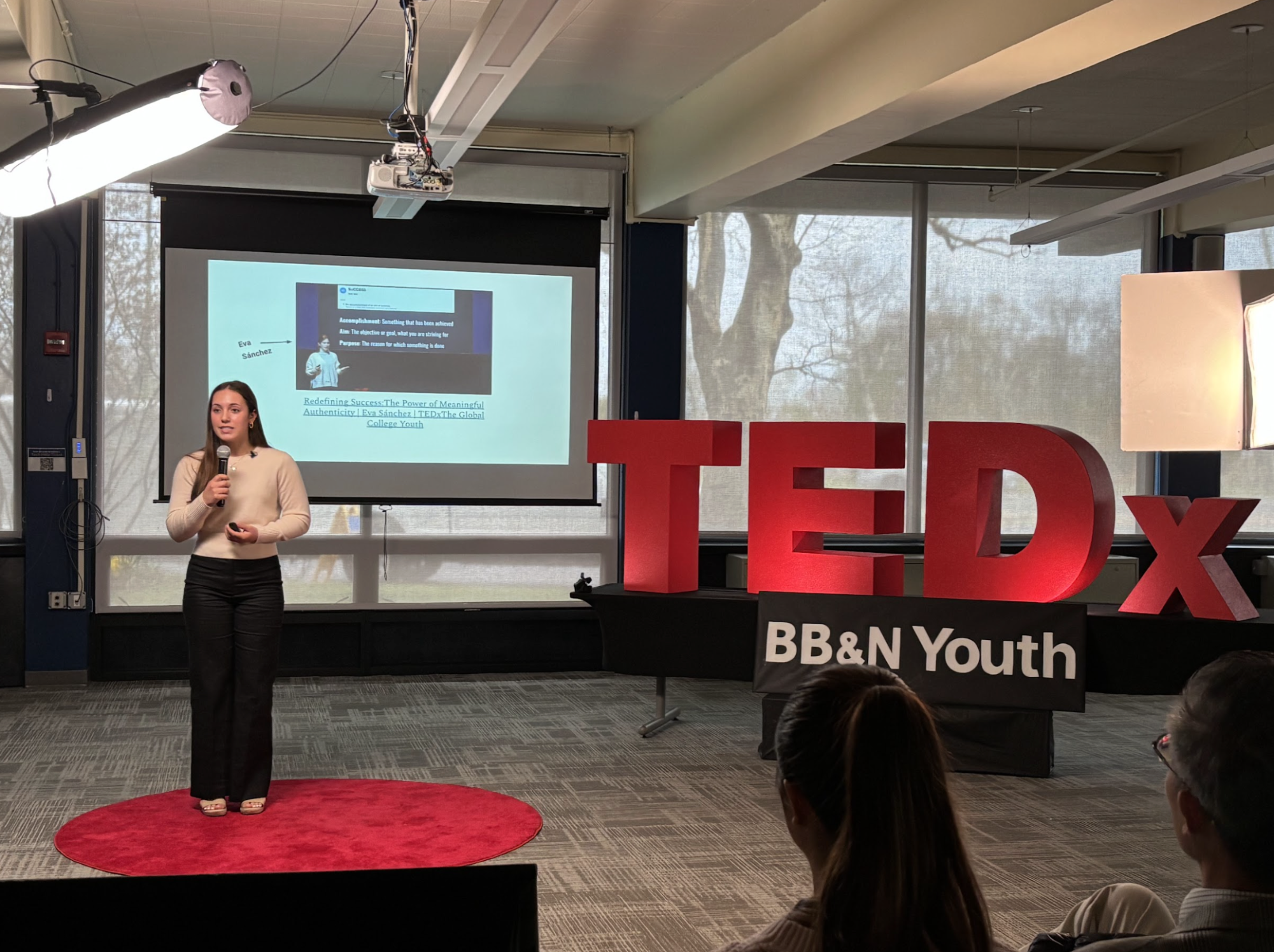 Valor McGrath ’28 speaks at the Upper School TEDx event. She used a math equation to explain her perspective.