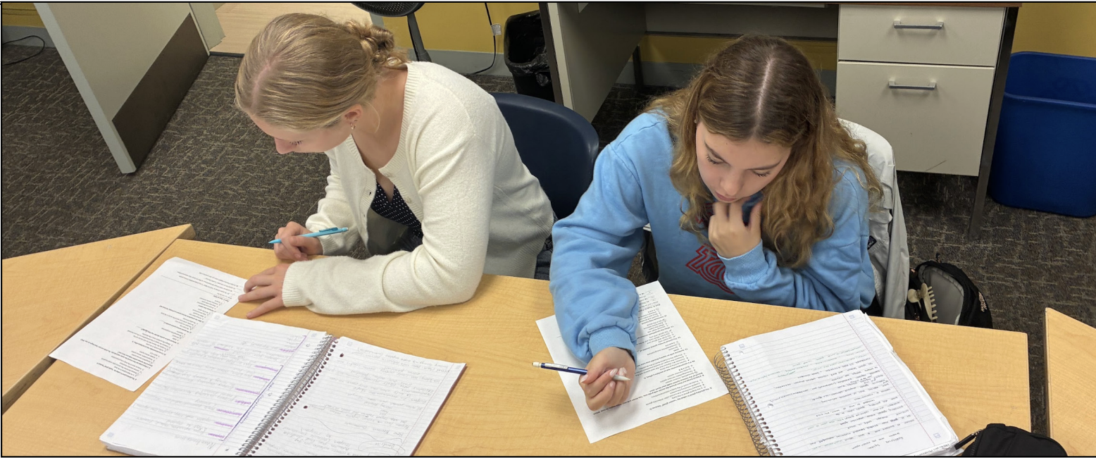 Ace Van Vliet and Maia Deming (both ’27) take a test for their history elective. Retake policies previously varied across the Upper School.